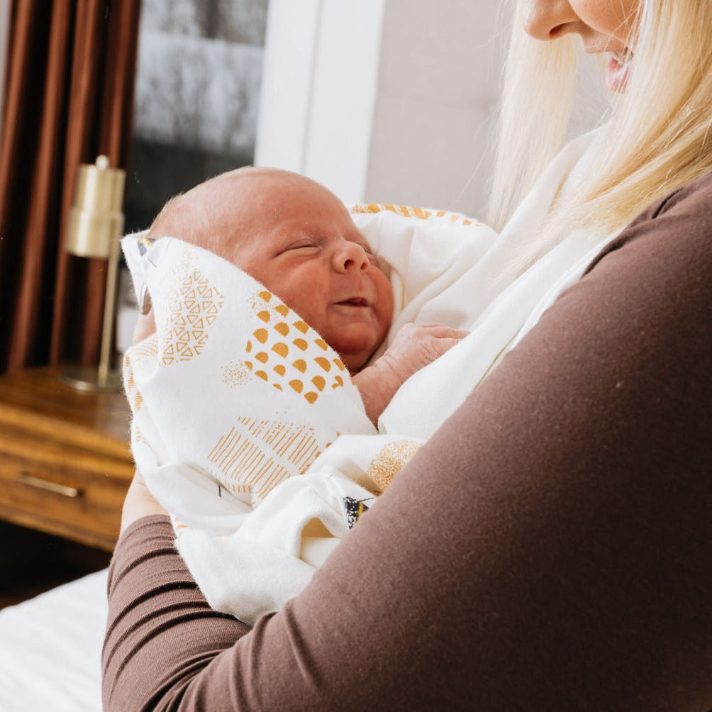 Newborn wrapped in classic towel